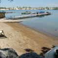 We have a small sandy beach near our boat ramp.